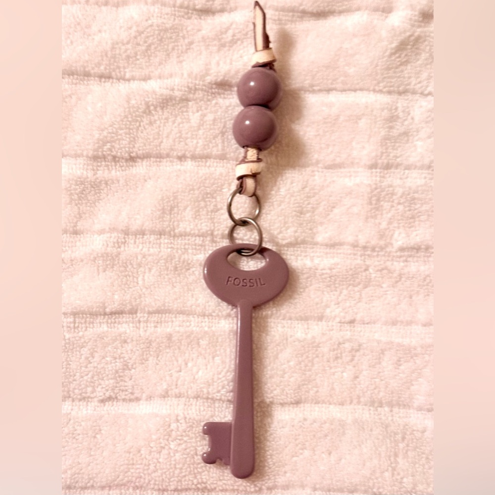 Fossil Vintange Key Bag Charm or Key chain. EUC, 
Color:Mauve